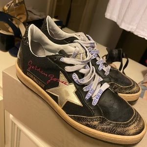 Golden Goose Black Ball Star with Swarovski crystals on back.